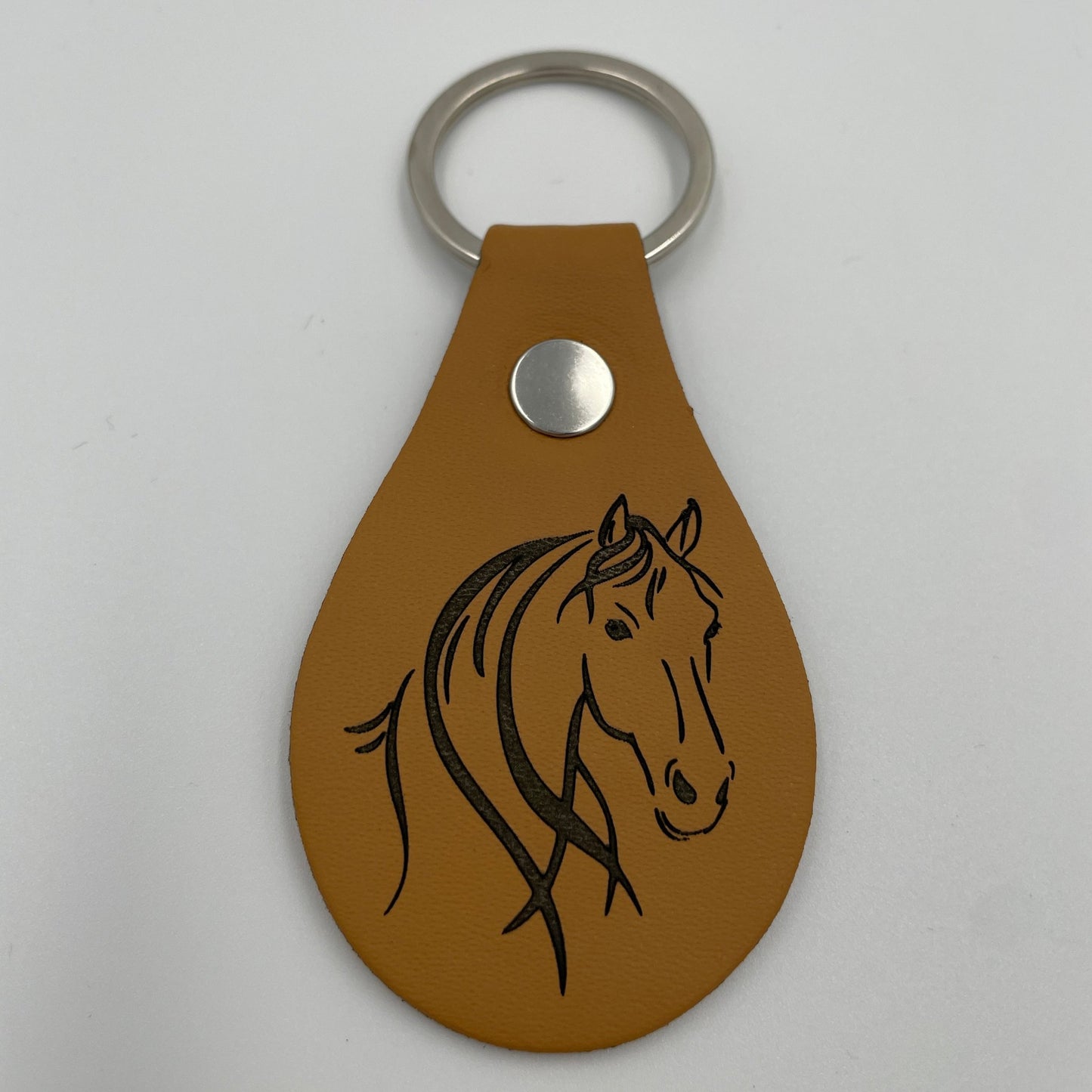 Stylischer Schlüsselanhänger mit Motiv Pferd aus hochwertigem Kunstleder